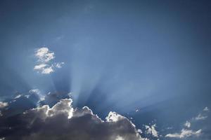 Silver Lined Storm Clouds with Light Rays and Copy Space photo