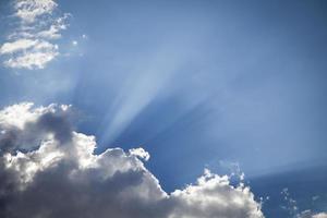 Silver Lined Storm Clouds with Light Rays and Copy Space photo