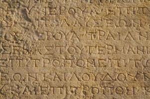 A close up of ancient Greek text. photo