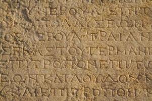 A close up of ancient Greek text. photo