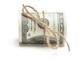 Roll of One Hundred Dollar Bills Tied in Burlap String on White photo