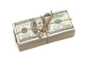 Stack of One Hundred Dollar Bills Tied in a Burlap String on White photo