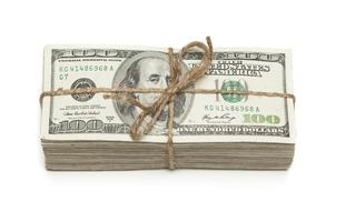 Stack of One Hundred Dollar Bills Tied in a Burlap String on White photo