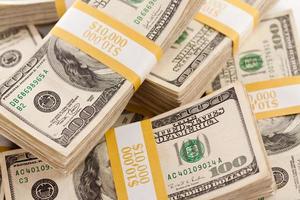 Stacks of One Hundred Dollar Bills photo