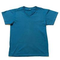 Worn old blue t shirt on white background photo