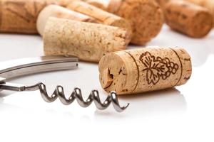 Corkscrew and corks photo