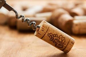 Corkscrew and corks photo