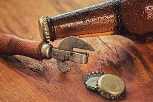 Vintage opener and beer photo