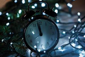 Alarm clock and christmas lights photo