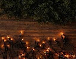 Christmas lights and branches of spruce photo