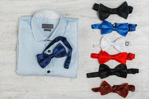 Shirt and different bow ties photo