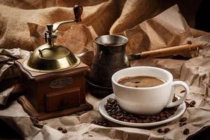 Coffee cup and cezve for turkish coffee photo