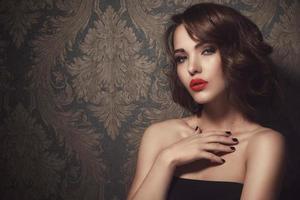 Portrait of beautiful woman with red lips
