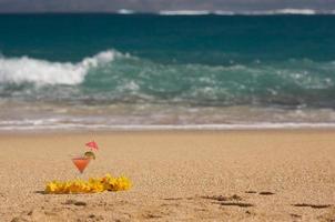 Tropical Drink on Beach Shoreline photo