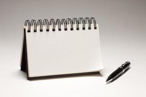 Blank Spiral Note Pad and Pen photo