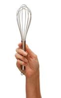Woman Holding Egg Beater in the Air Isolated on White photo