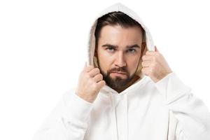 Handsome man wearing white hoodie on white background photo