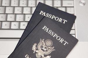 Passports on Laptop Keyboard photo