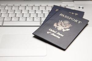 Passports on Laptop Keyboard photo