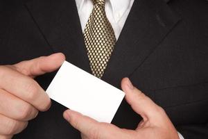 Businessman Holding Blank Business Card photo