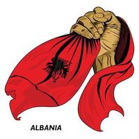 puño de mano sosteniendo la bandera albanesa. ilustración vectorial de la mano levantada y agarrando la bandera. bandera colgando alrededor de la mano. formato eps vector