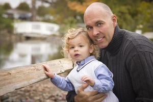 Handsome Father and Son in the Park photo