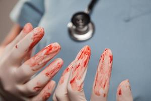 Abstract of Bloody Surgical Gloves photo