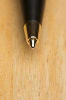 Ball Point Pen Macro on Wood photo
