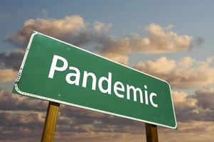 Pandemic Green Road Sign photo