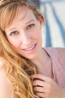 Outdoor Portrait of Young Adult Brown Eyed Woman. photo