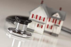 Stethoscope with Small Model Home photo