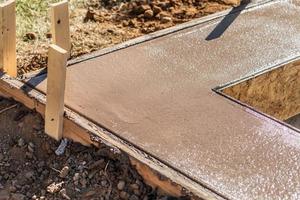 Fresh Pool Coping Cement Drying Within Wood Framing photo