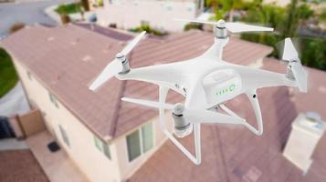 SAR - Search and Rescue Unmanned Aircraft System, Drone Flying Above A House photo