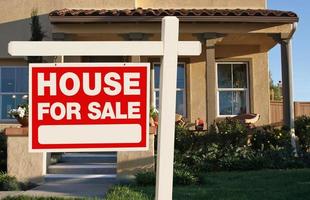 Home For Sale Sign and New Home photo