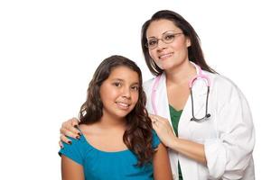 Pretty Hispanic Girl and Female Doctor photo