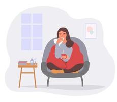 The girl is sitting at home in quarantine, sick, sneezing. A woman is being treated for a cold, drinks medicine, warms up with a hot drink. Vector graphics.