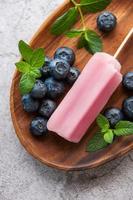 Homemade blueberry ice cream or popsicles photo