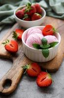 Homemade strawberry  ice cream with fresh strawberries photo