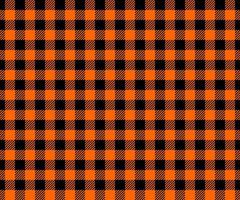 Halloween or Thanksgiving day seamless pattern. Black and orange gingham plaid texture with whole and striped squares. Checkered background for fall blanket or tablecloth vector