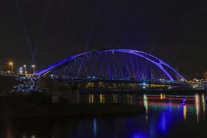 Night picture of East harbor bridge in Frankfurt during lighting show Luminale 2014 in April photo