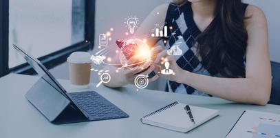woman Hand holding virtual Global Internet connection metaverse. Business global internet connection application technology and digital marketing, Financial and banking, Digital link tech, big data. photo