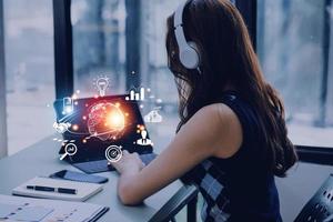 woman Hand holding virtual Global Internet connection metaverse. Business global internet connection application technology and digital marketing, Financial and banking, Digital link tech, big data. photo