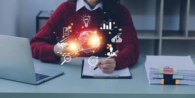 woman Hand holding virtual Global Internet connection metaverse. Business global internet connection application technology and digital marketing, Financial and banking, Digital link tech, big data. photo