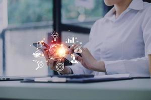 woman Hand holding virtual Global Internet connection metaverse. Business global internet connection application technology and digital marketing, Financial and banking, Digital link tech, big data. photo