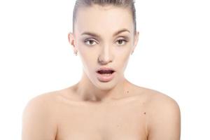 Pretty young girl with brown eyes in studio photo