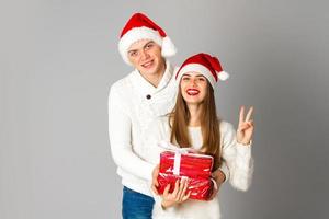 couple celebrate christmas with gifts photo