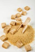 Brown cane sugar and in pieces photo