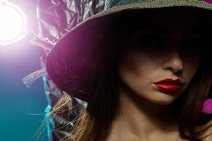 closeup of young beautiful girl in hat photo