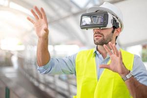 Caucasian man use VR glasses watching video for entertainment, work, free time and study. Virtual reality technology concept. photo