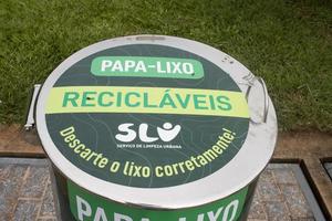 Brasilia, Brazil, December 21 2022 The New Sotkon Waste System to collect trash recently installed in Brasilia, the Green Containers indicate Plastic and Paper Trash photo